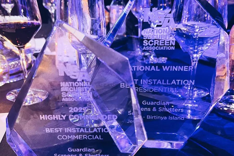 Two National Security Screen Association trophies made out to Guardian Screens & Shutters, National Winner Best Installation Residential and Highly Commended Best Installation Commercial